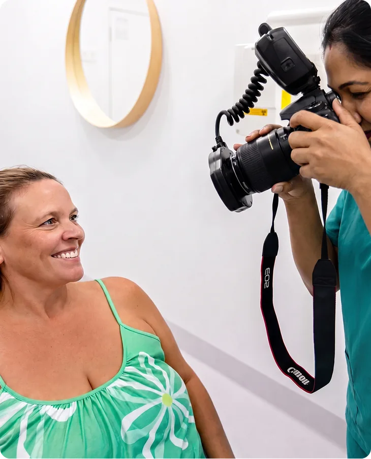 Smiling patient having smile photos taken for a cosmetic dentistry assessment at Carina Gardens Dental, Carina Brisbane